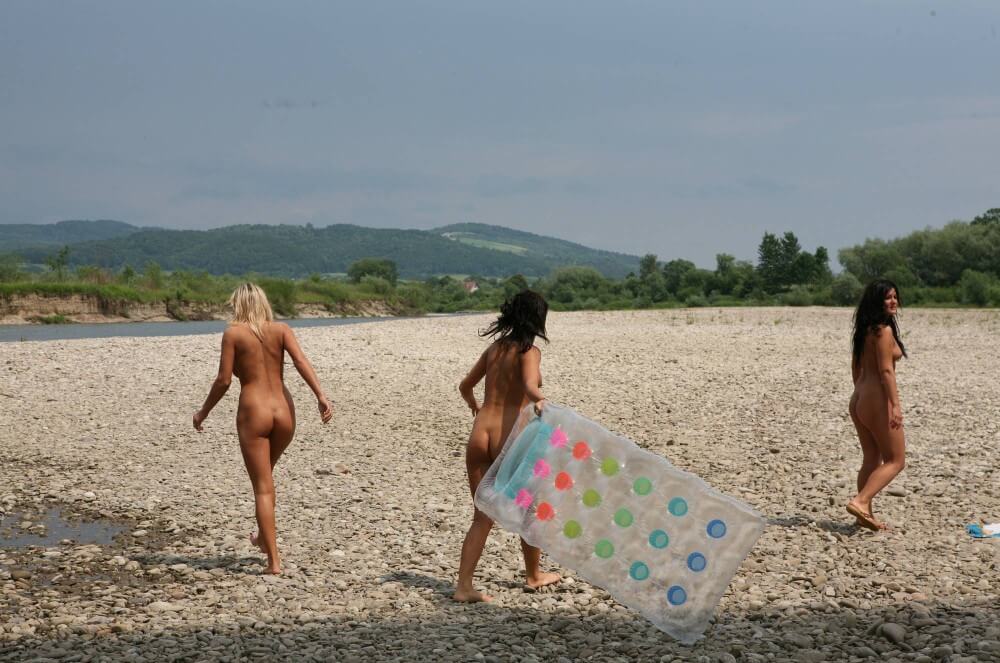 Naturist Park Floating On River photos - Naturism teaches respect for the beauty of the body and its natural forms