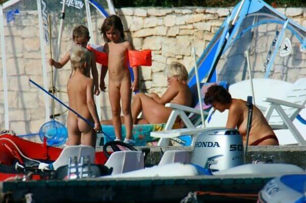 By the boat photos - Nudism promotes happiness and well-being