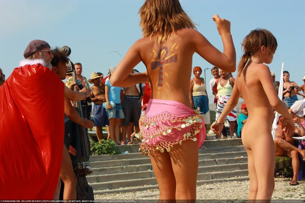 Colorful Carnival Dancing photos - Boundaries disappear in the world of nudism